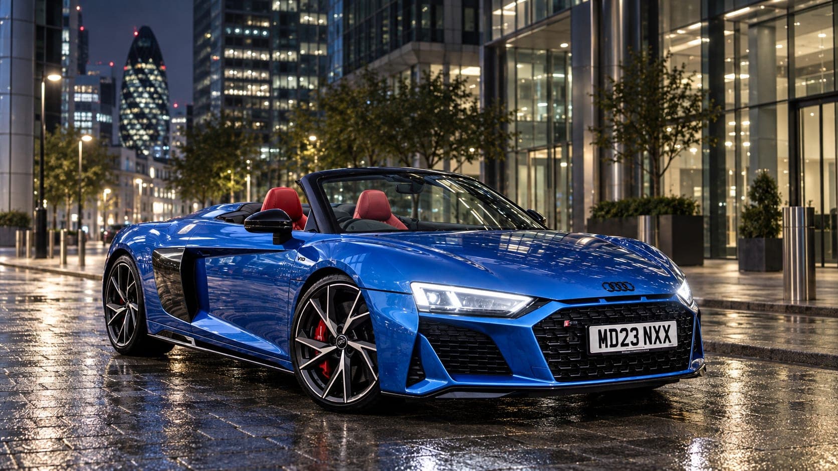 Audi R8 Spyder supercar in the city at night