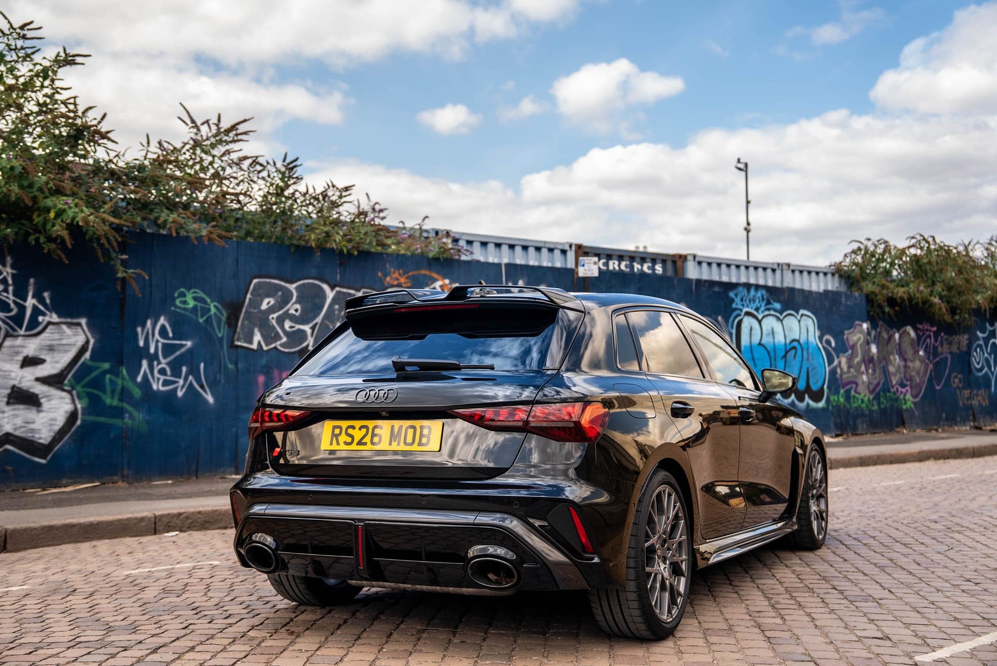 Rear three-quarter view of the Audi RS3 with its RS exhaust and diffuser