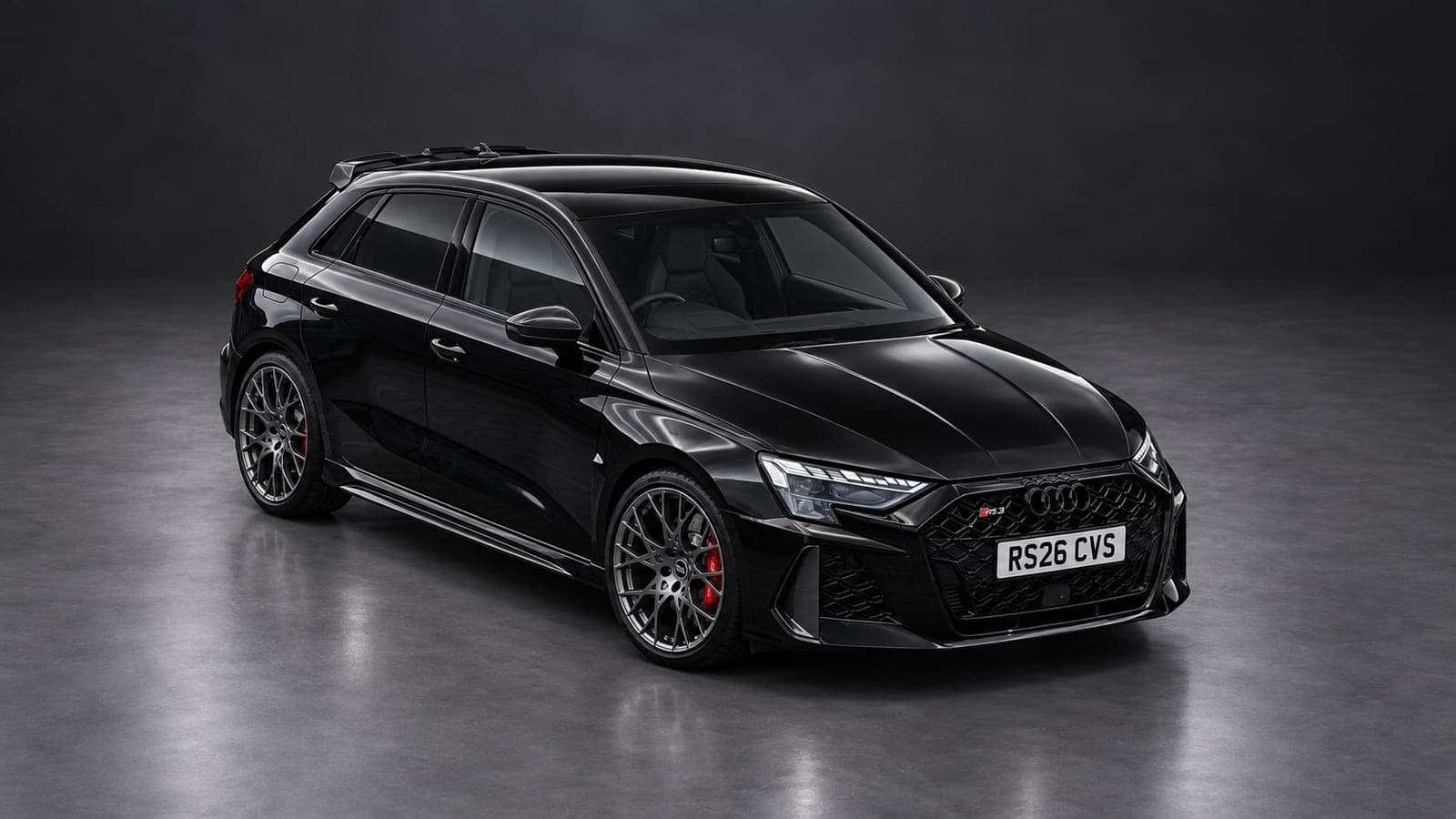 Audi RS3 Sportback — elevated front, studio