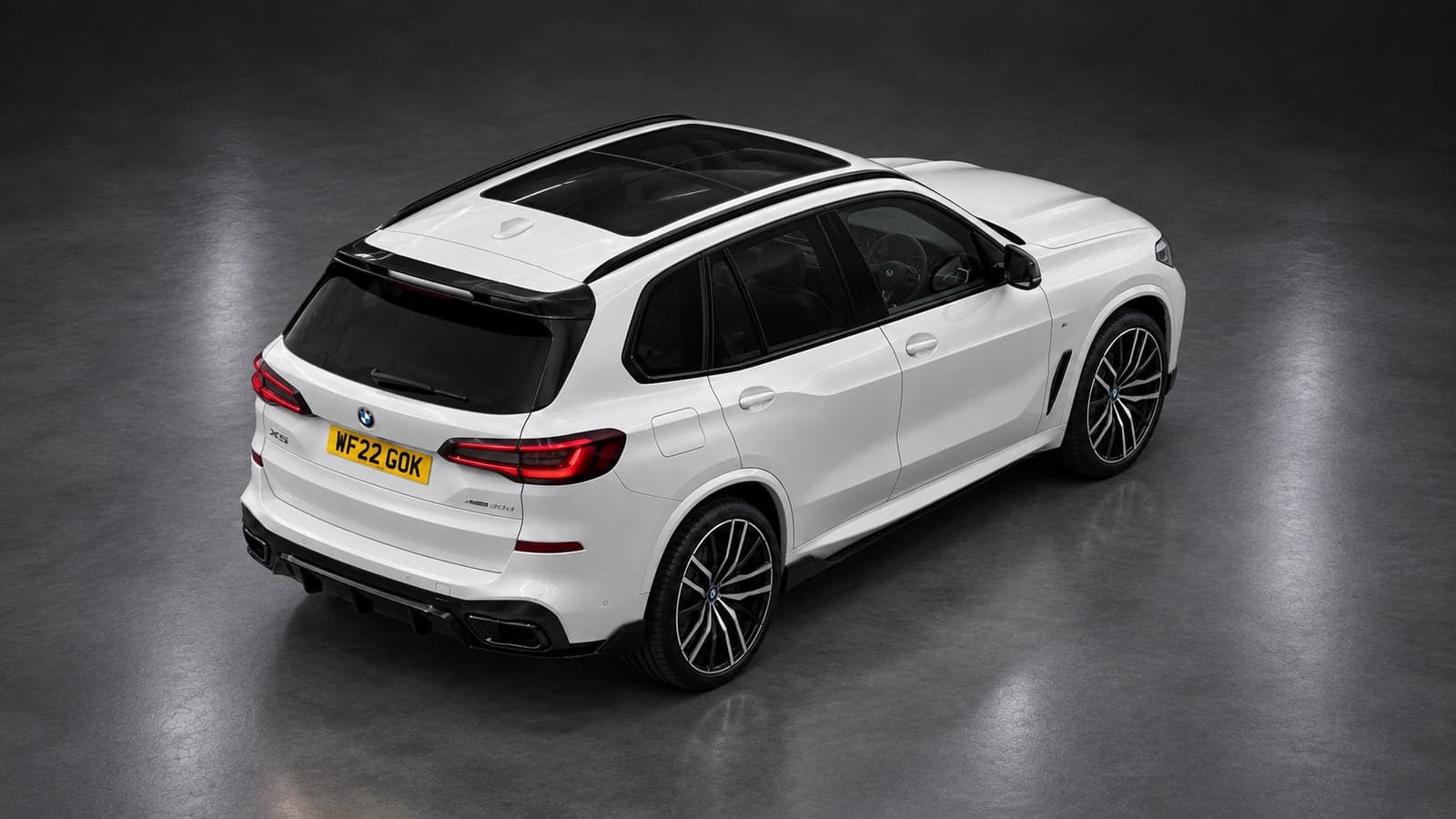 BMW X5 — elevated rear, studio