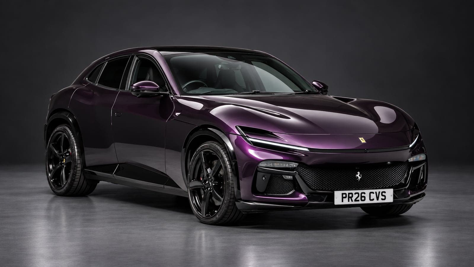 Aubergine Ferrari Purosangue, front three-quarter — V12 luxury hire from CVS Car Hire