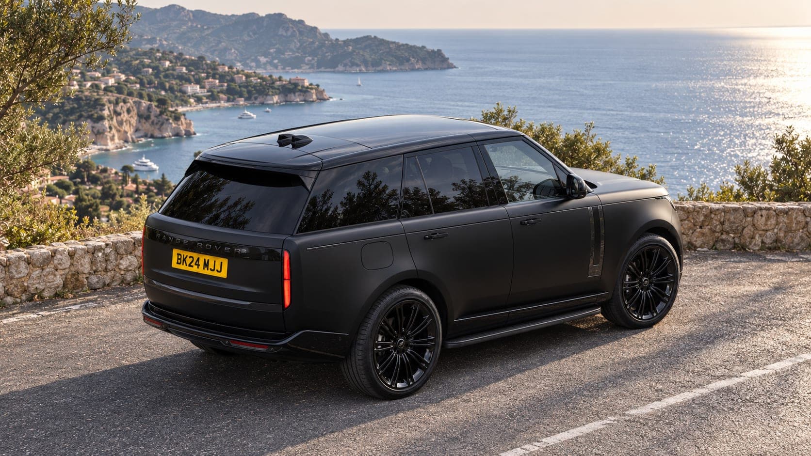 Range Rover Vogue on a coastal road