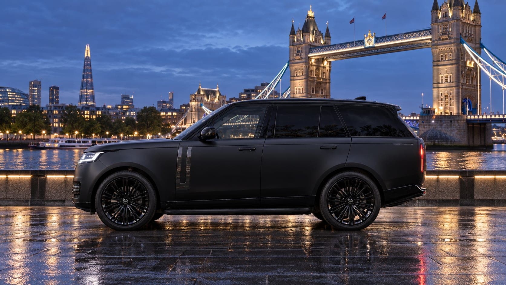 Matte black Range Rover Vogue by Tower Bridge, London