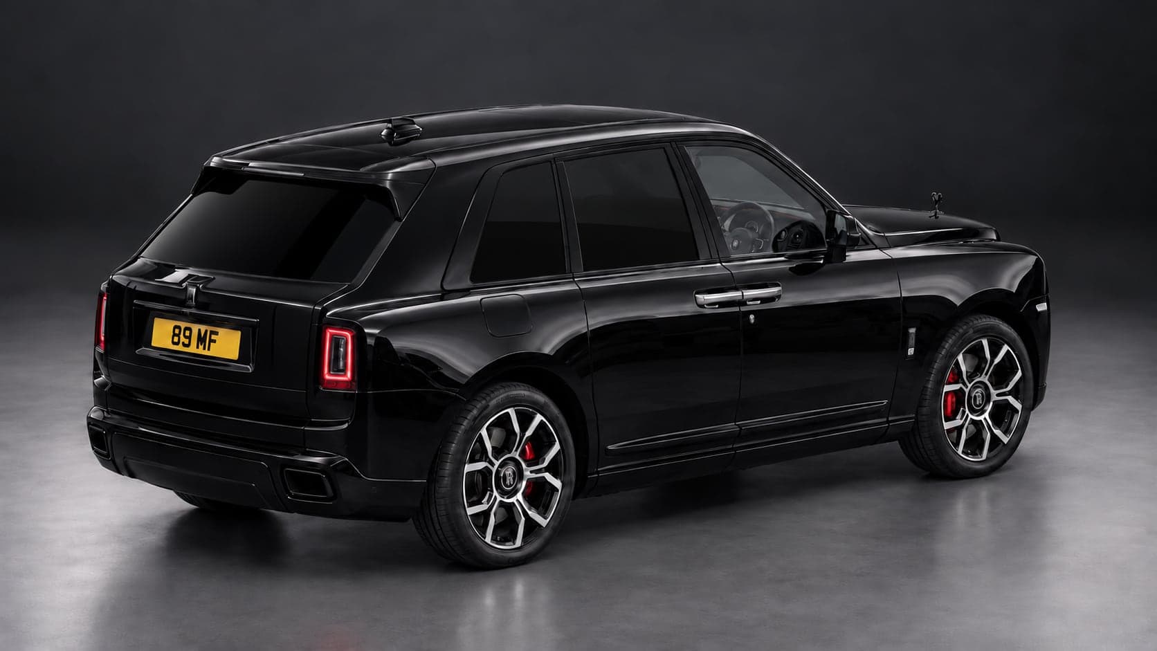 Rolls-Royce Cullinan — elevated rear, studio