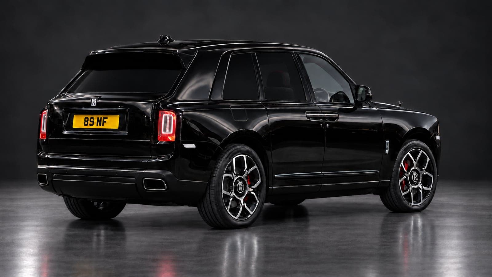 Rolls-Royce Cullinan — rear three-quarter, studio
