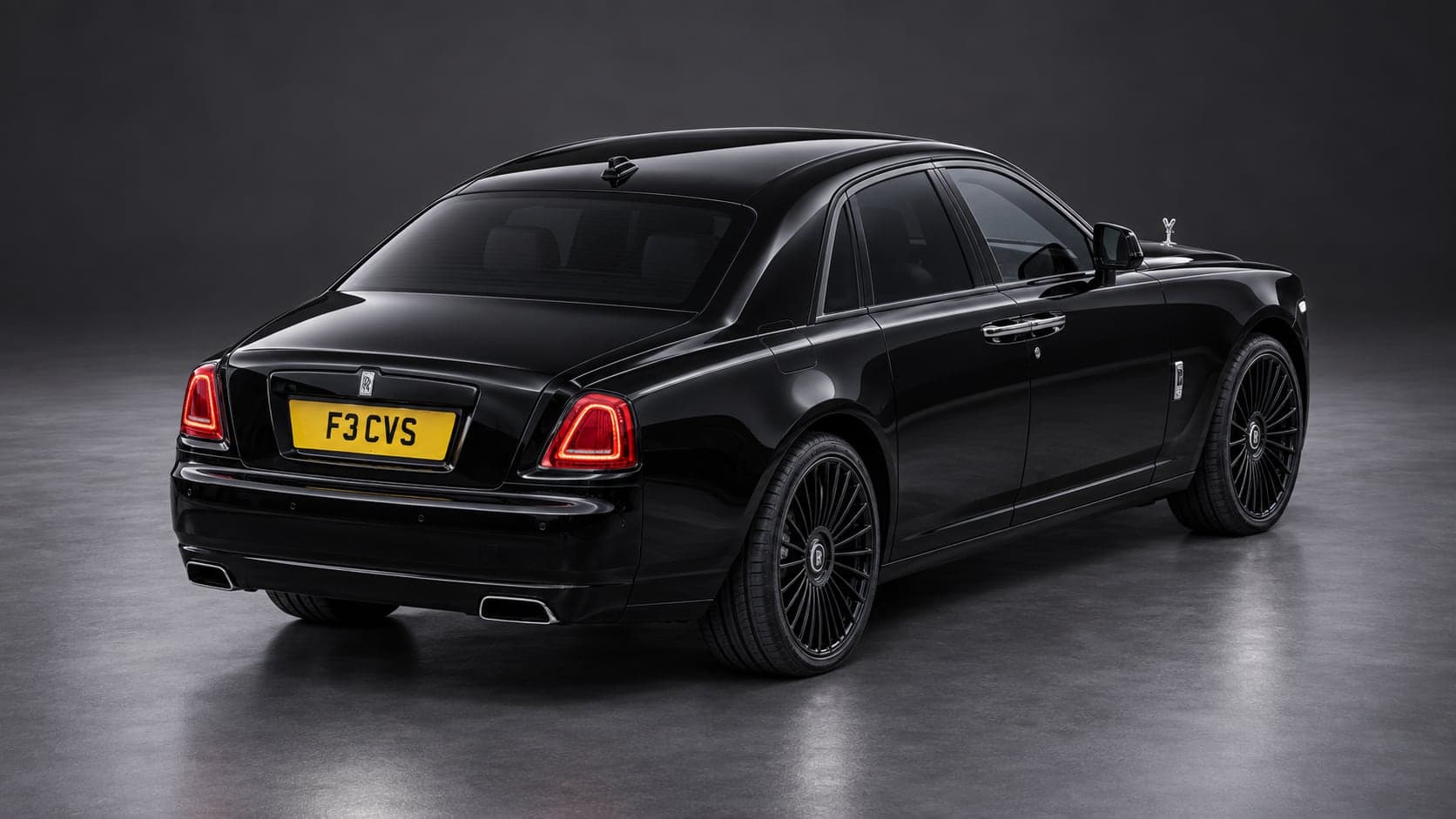 Rolls-Royce Ghost — elevated rear, studio