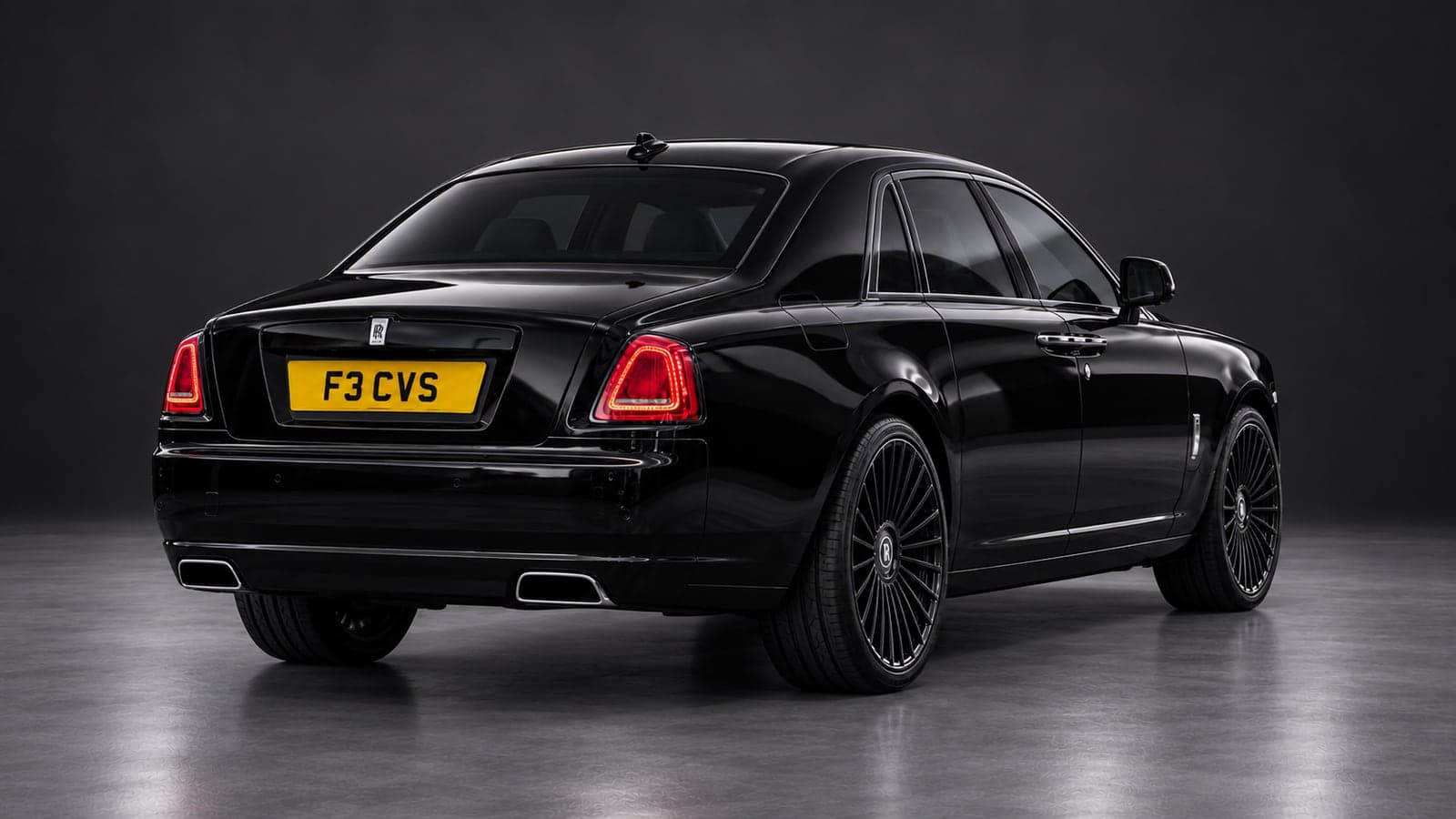 Rolls-Royce Ghost — rear three-quarter, studio