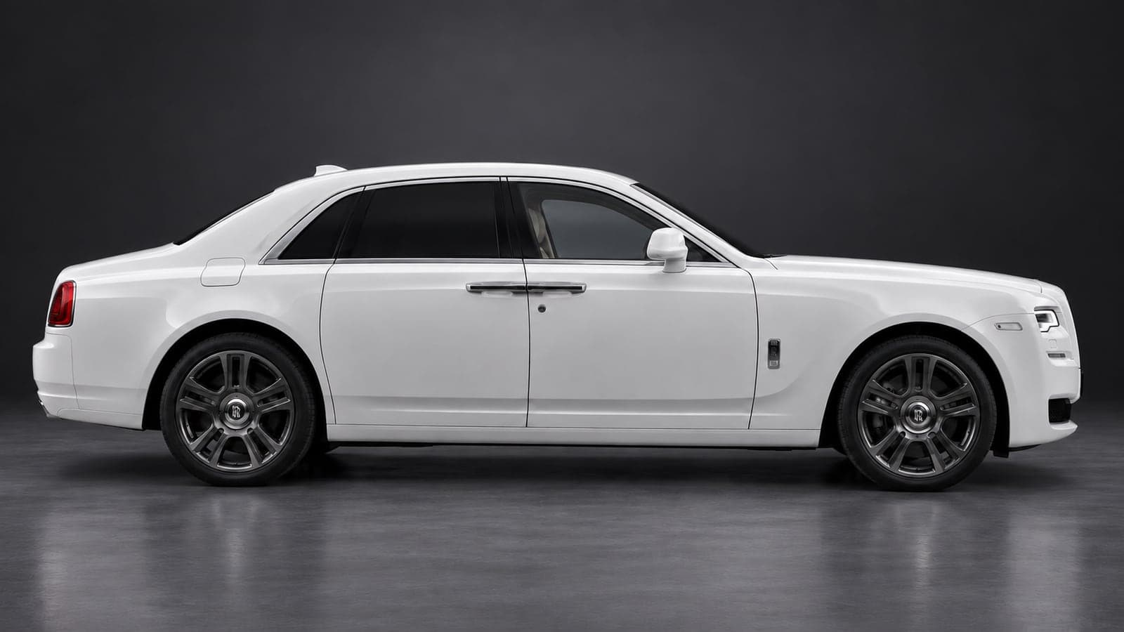 White Rolls-Royce Ghost — side profile, studio