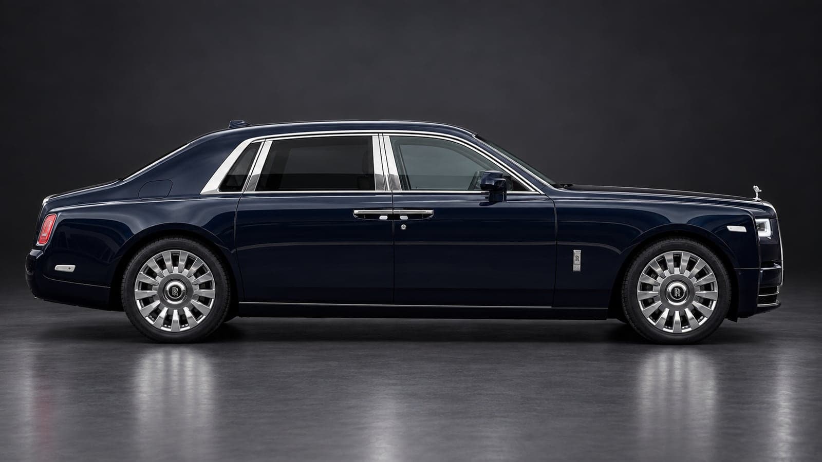 Navy Rolls-Royce Phantom VIII, side profile, available to hire from CVS Car Hire