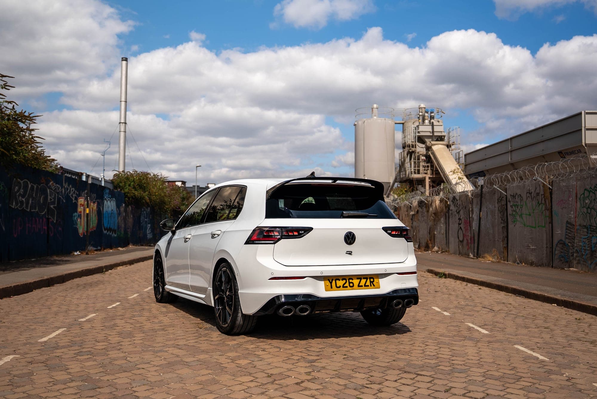 Rear three-quarter view of the white Volkswagen Golf R
