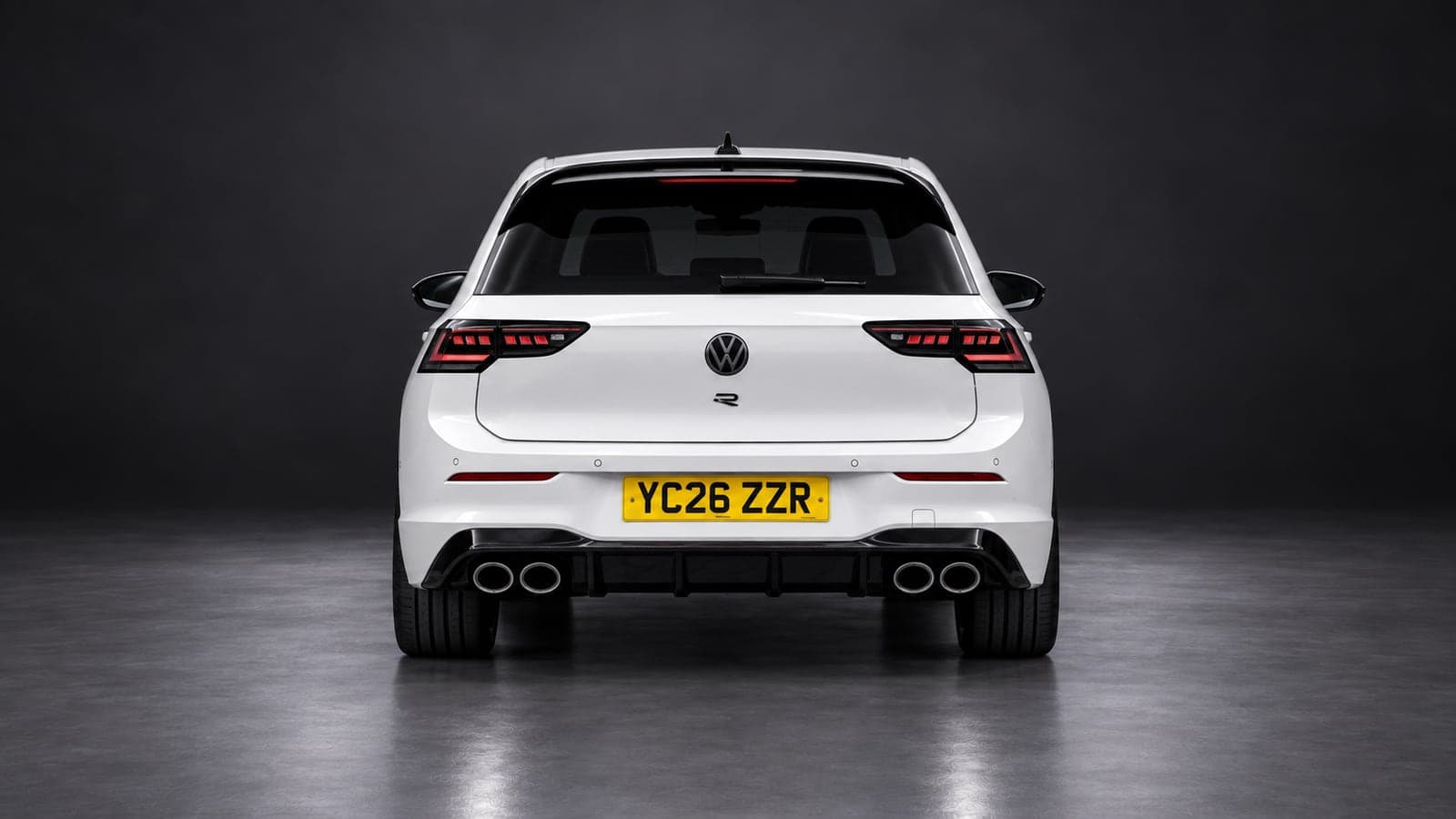 White Volkswagen Golf R — rear, studio