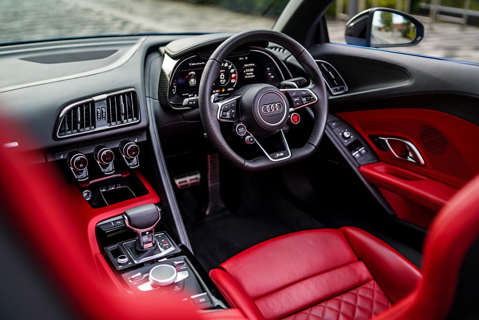 Audi R8 Spyder virtual cockpit and red leather interior