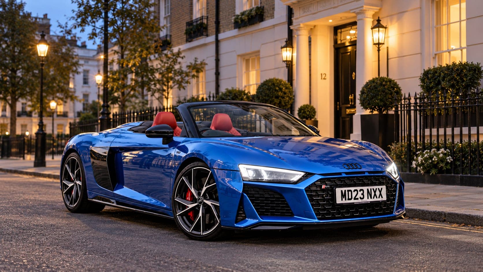 Blue Audi R8 Spyder V10 outside a Belgravia townhouse, available to hire from CVS Car Hire