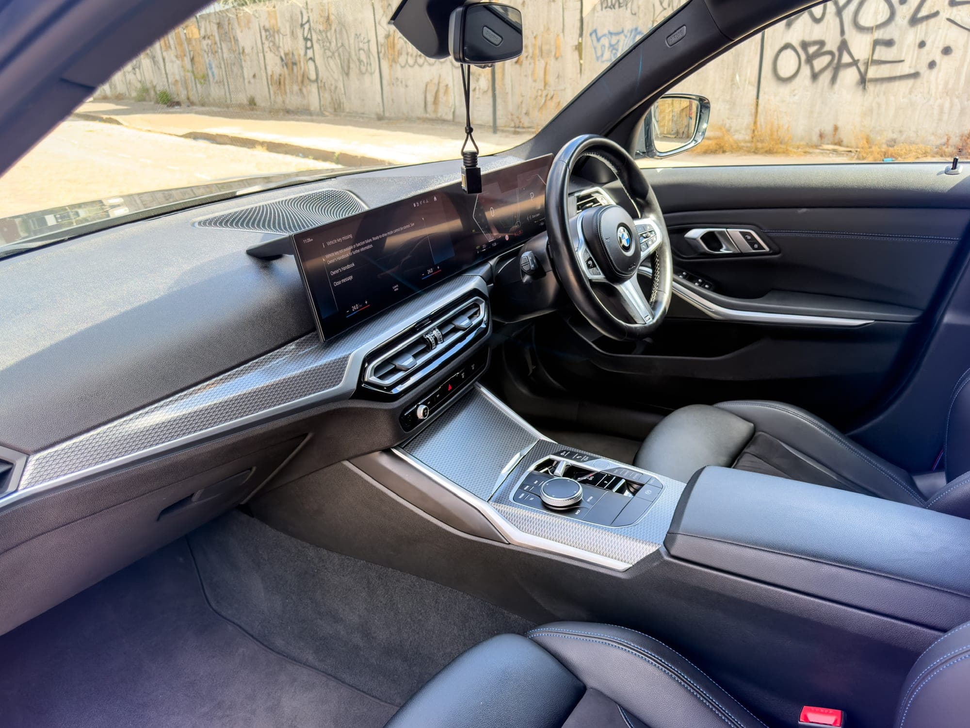 BMW 3 Series steering wheel and curved display