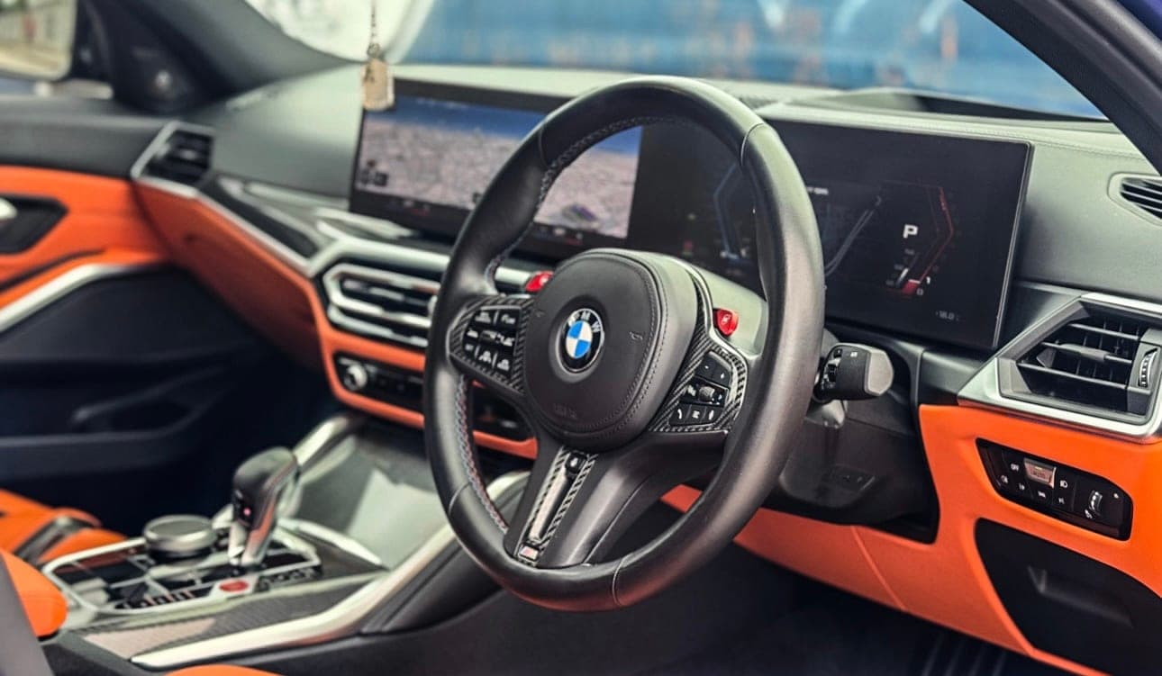 BMW M3 cockpit with its M steering wheel