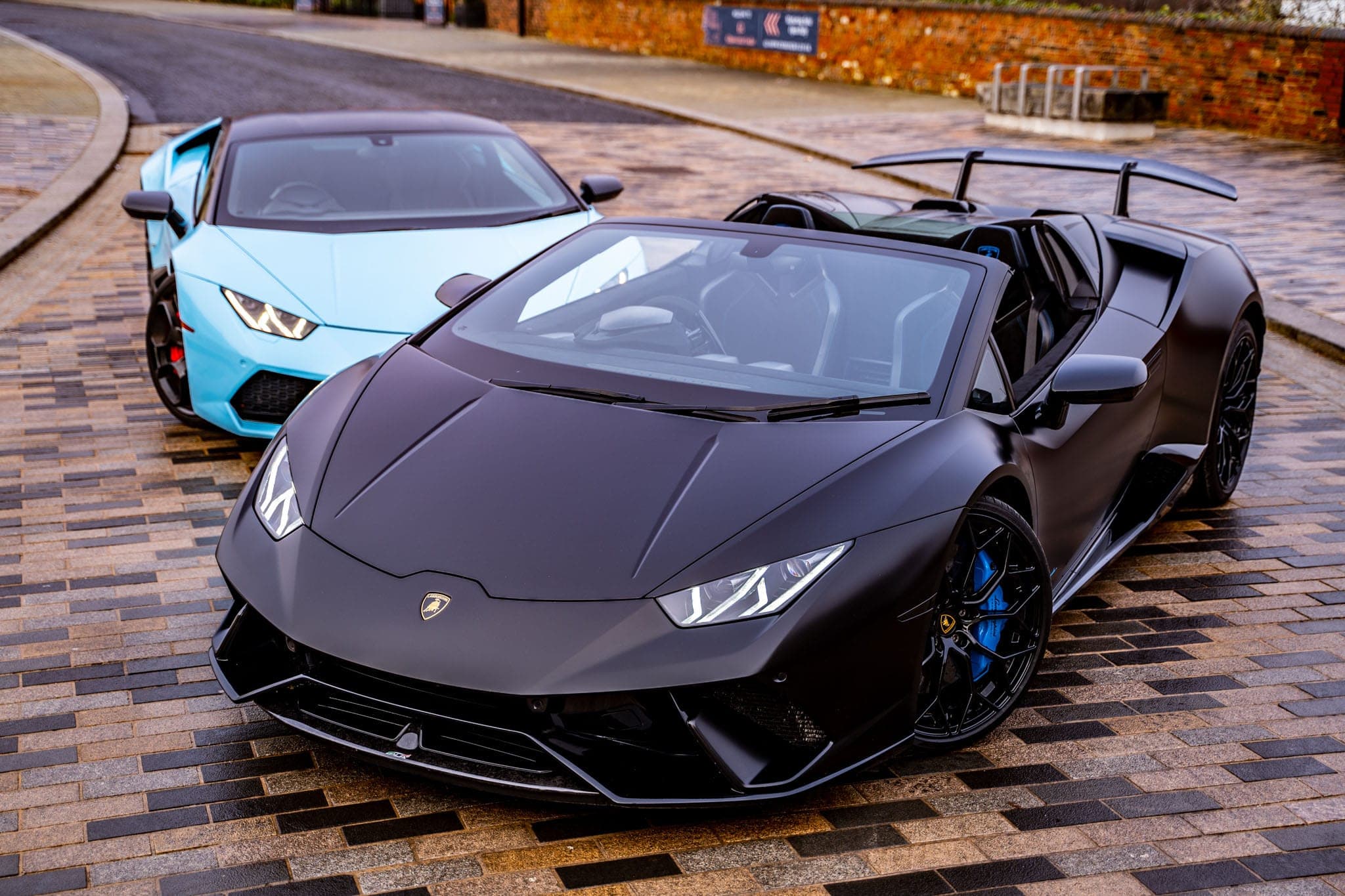 Lamborghini Huracán Performante Spyder alongside a second Huracán
