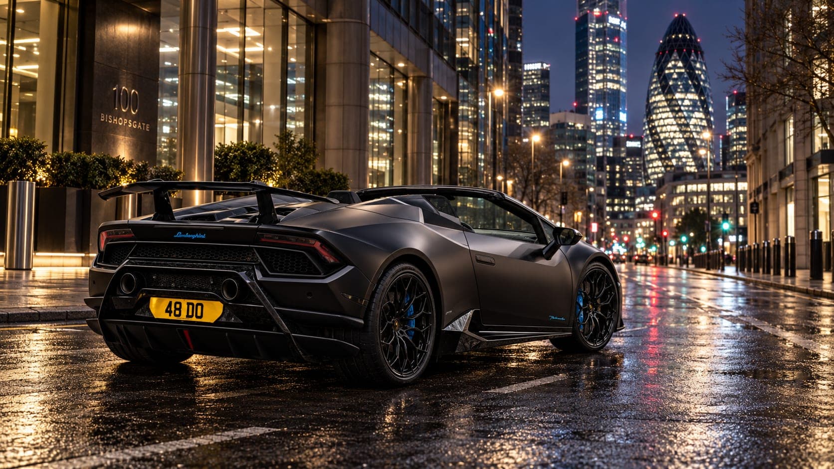 A Lamborghini Huracán supercar in the city at night