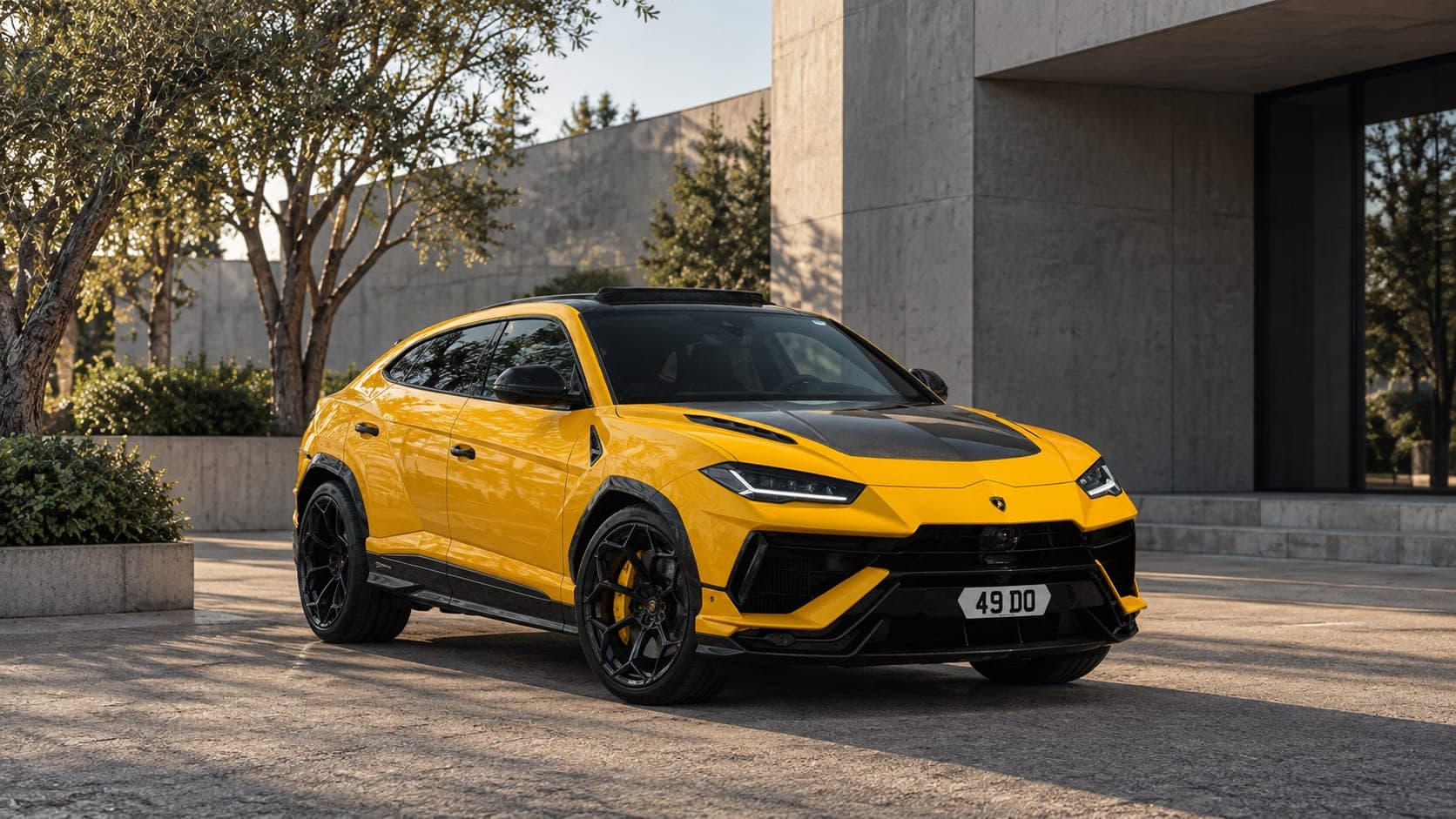 Yellow Lamborghini Urus Performante against modern architecture, available to hire from CVS Car Hire