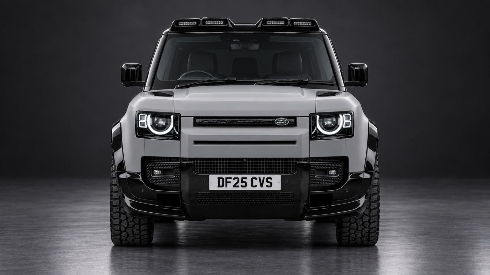 White Land Rover Defender, head-on, available to hire from CVS Car Hire
