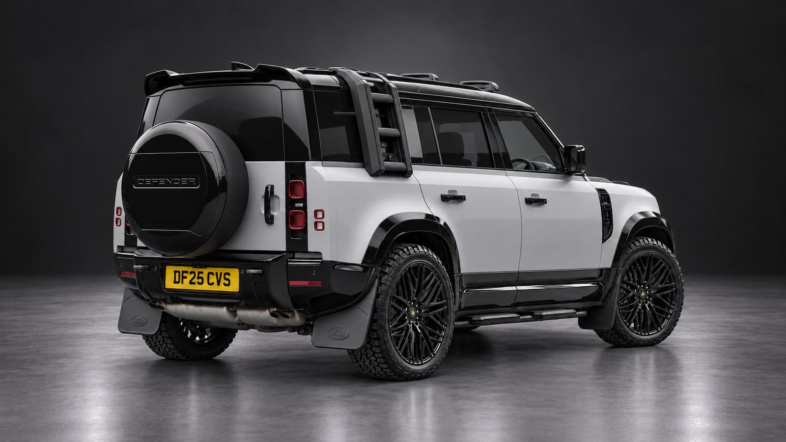 Land Rover Defender — rear three-quarter, studio