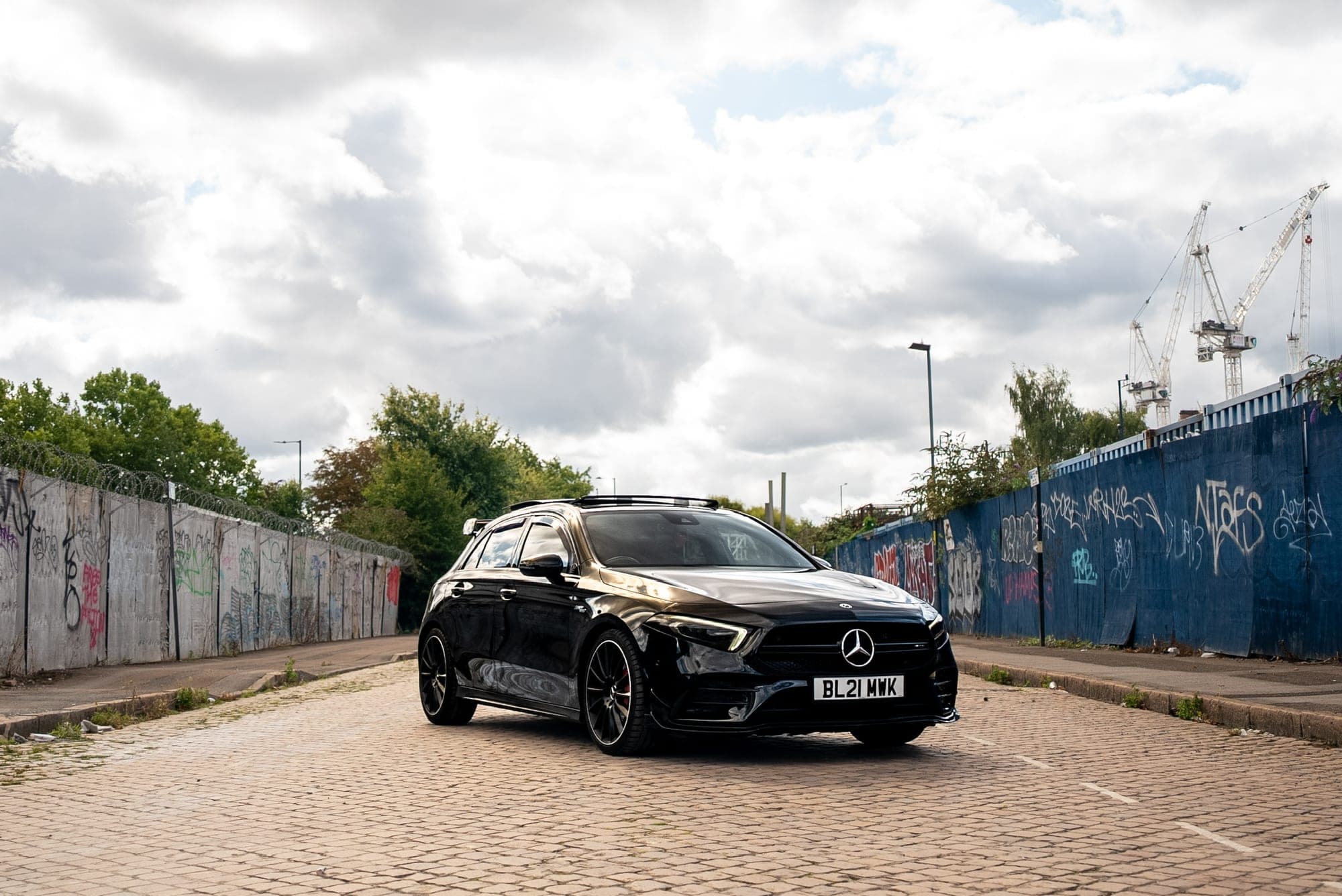 Front three-quarter view of the black Mercedes-AMG A 35