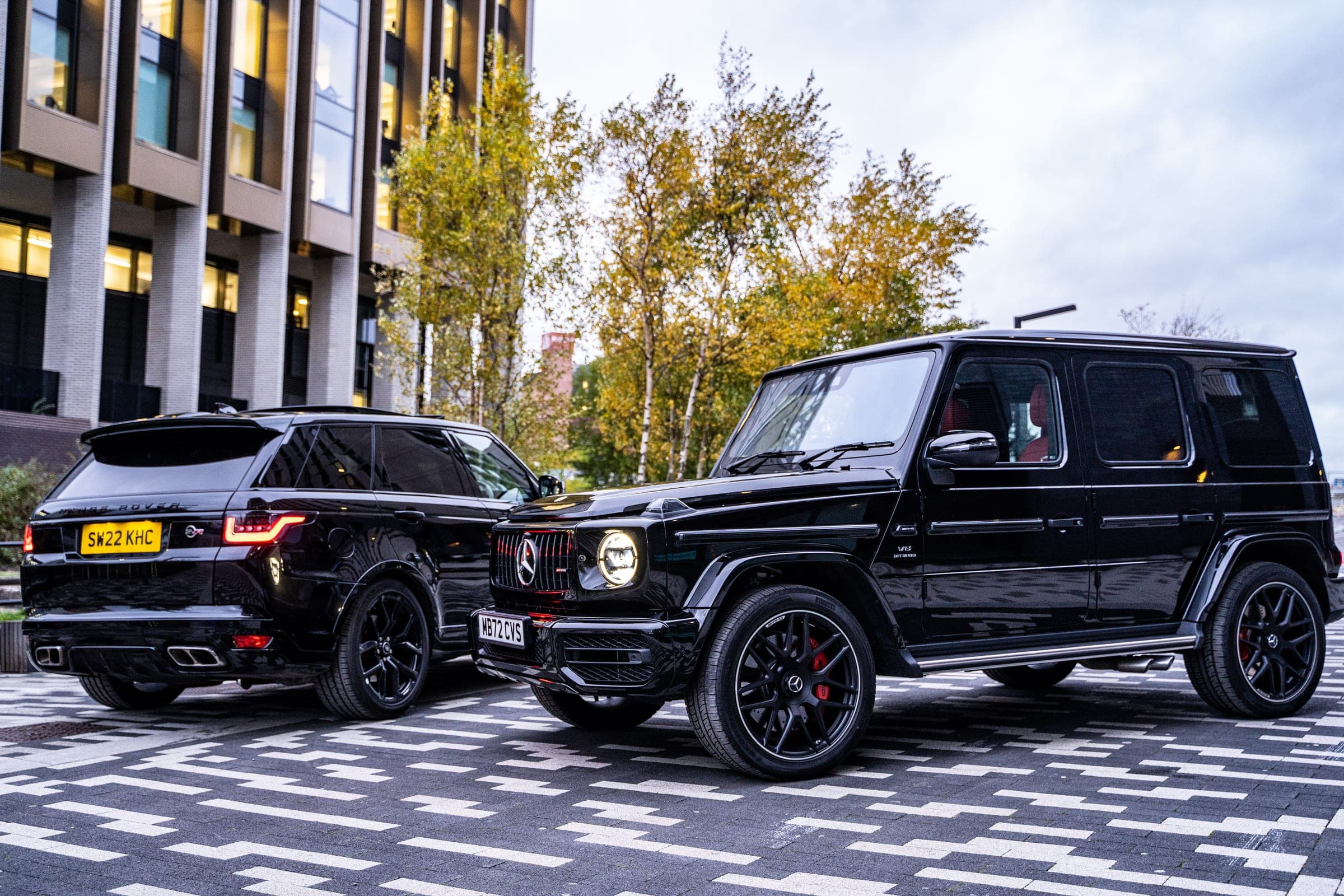 Mercedes-AMG G 63 alongside a Range Rover Sport