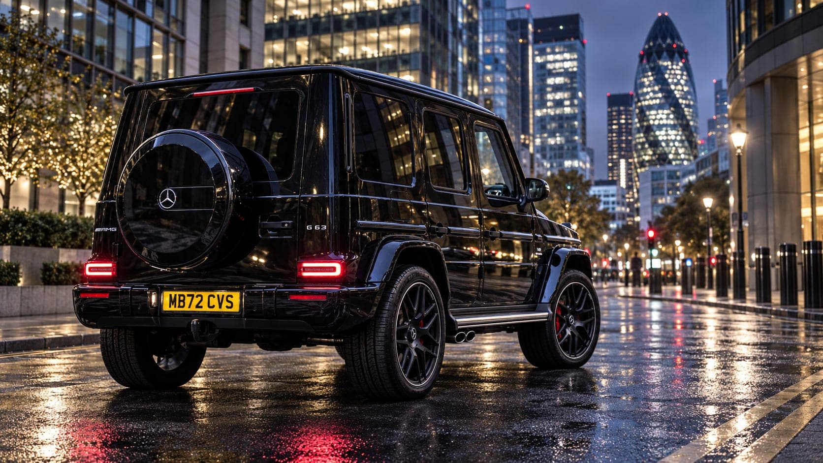 A black Mercedes-AMG G63 in the City of London at night
