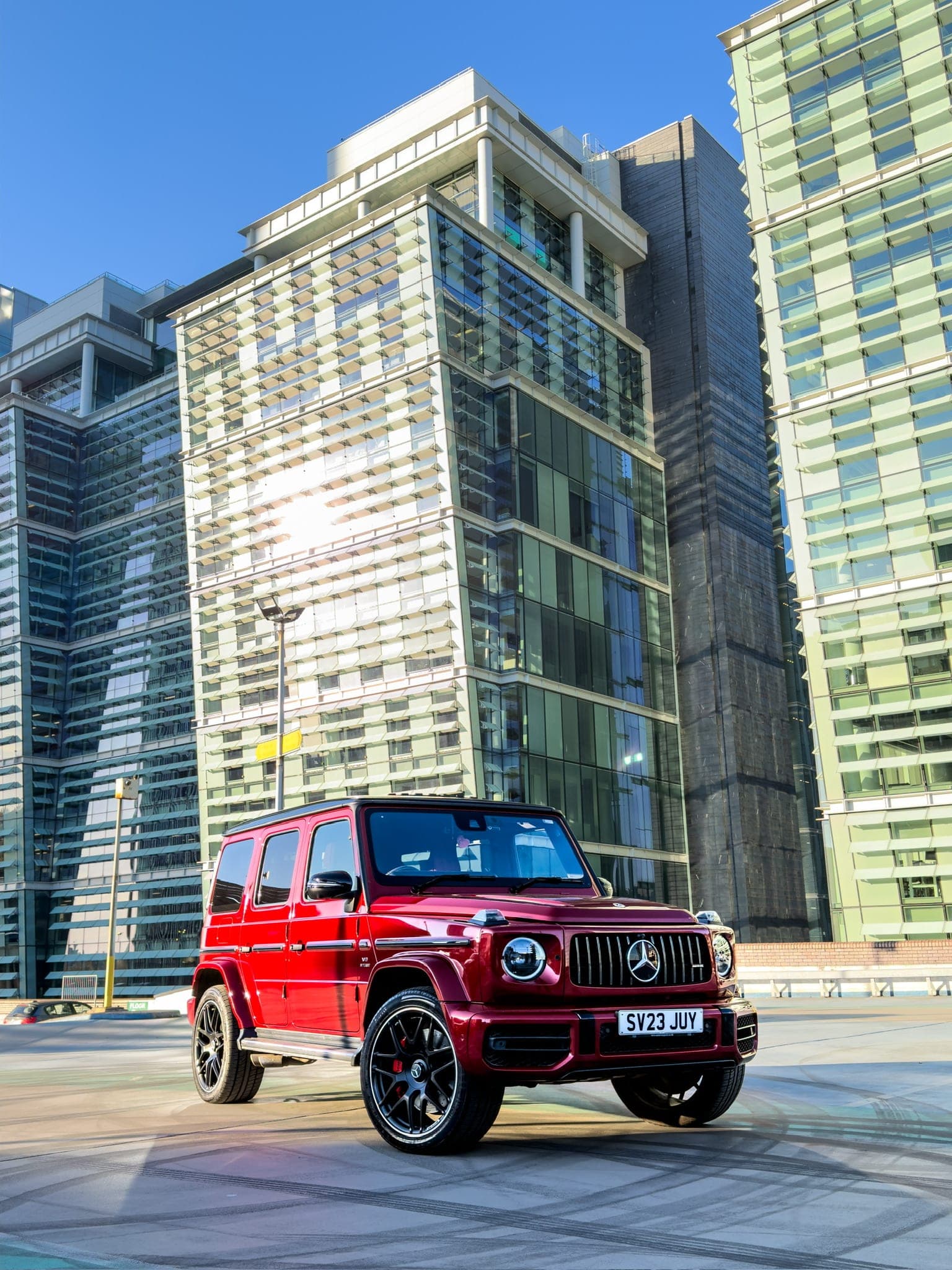 Side profile of the red Mercedes-AMG G 63