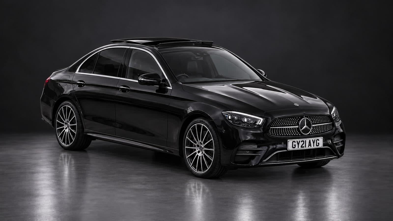 Mercedes-Benz E-Class AMG Line — elevated front, studio
