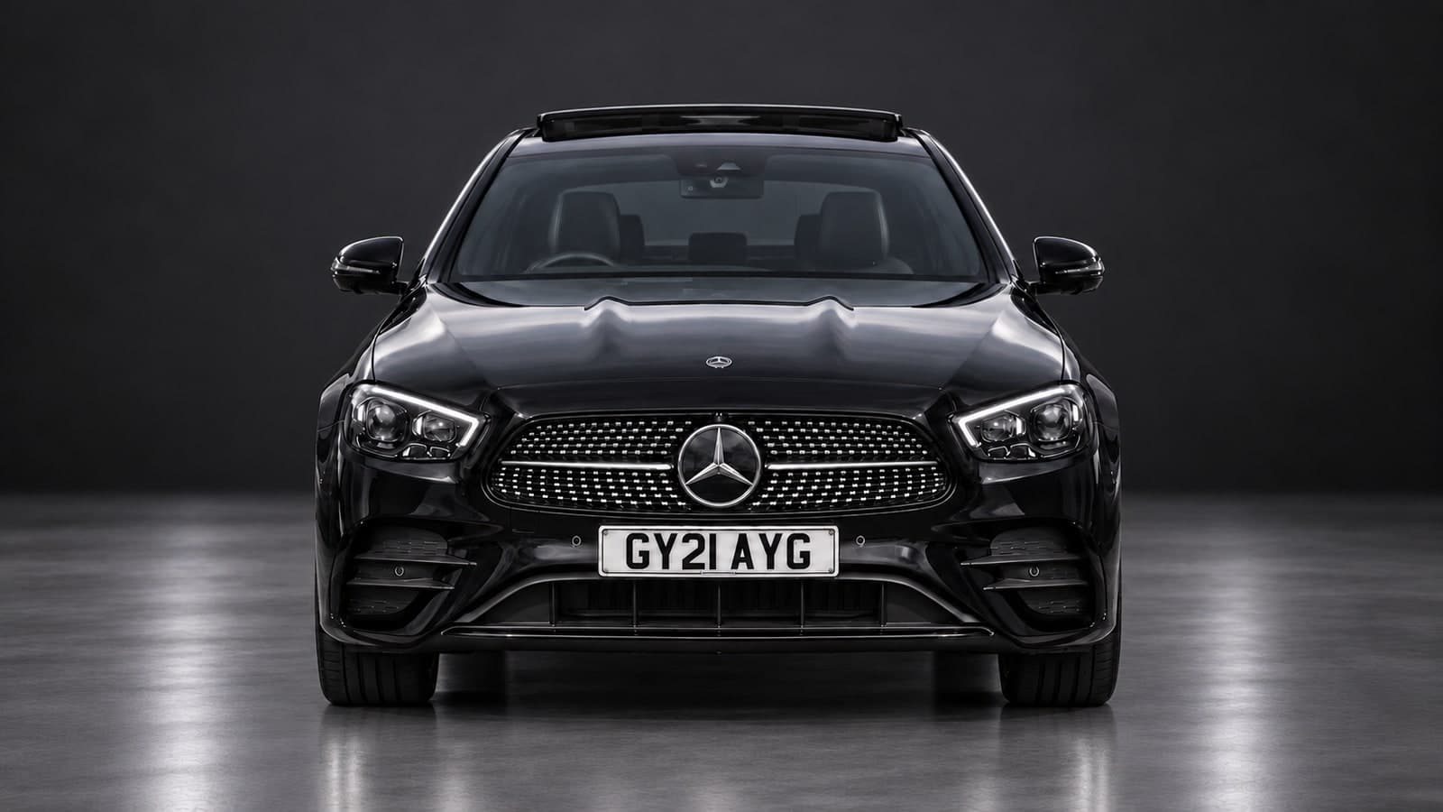 Mercedes-Benz E-Class AMG Line — head-on, studio