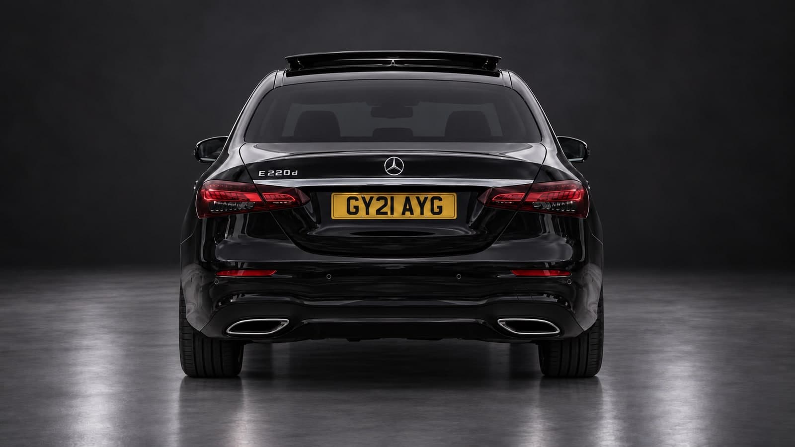 Mercedes-Benz E-Class AMG Line — rear, studio