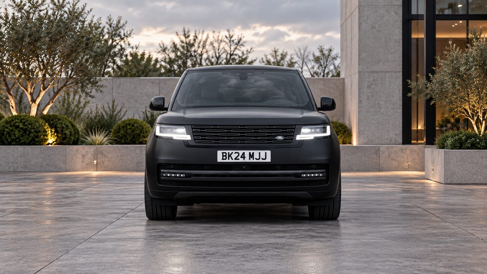Matte black Range Rover Vogue, front three-quarter, available to hire from CVS Car Hire