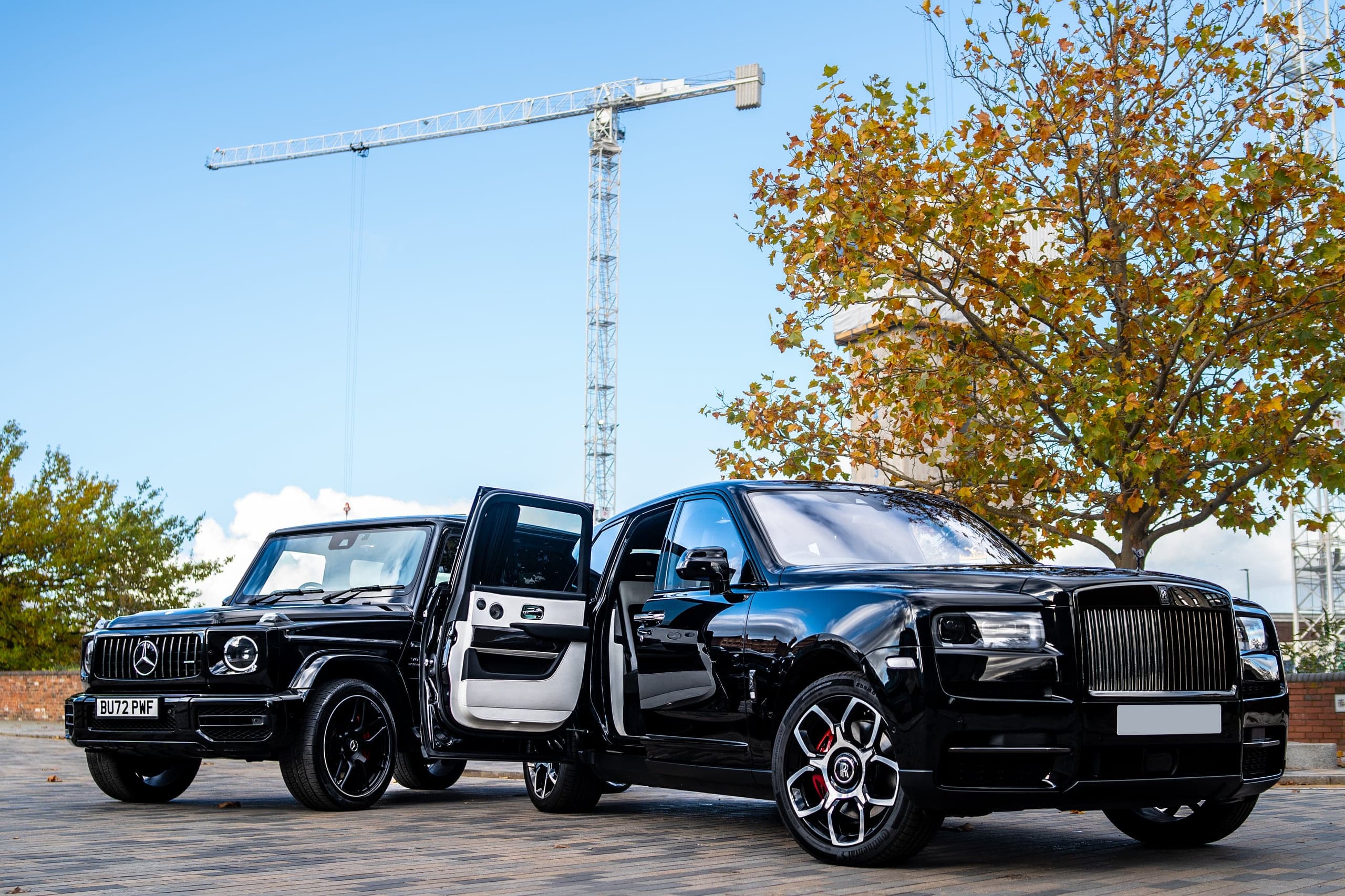 A black Rolls-Royce Cullinan and Mercedes-AMG G 63 from the CVS Car Hire fleet